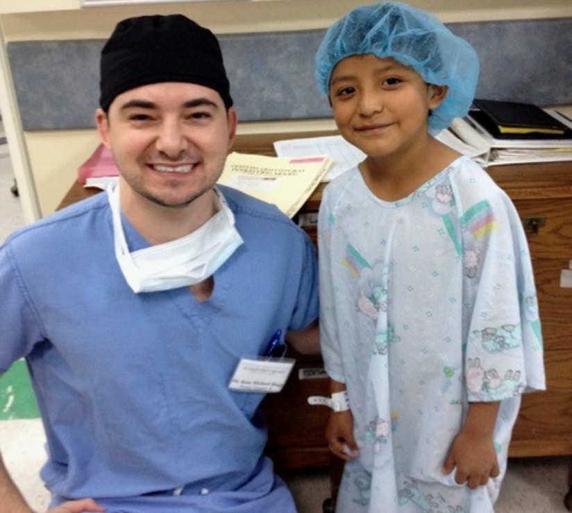 Dr. Blagg with child patient